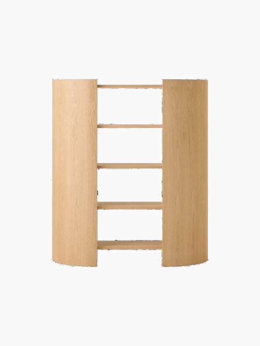 Back view of a light oak shelving unit with four shelves, framed by two curved side panels, on a black background.