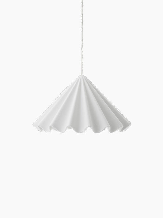 Front view of the white Dancing Pendant Lamp. Its pleated felt shade resembles a dancer's twirling skirt with a wavy hem.