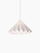 The white Dancing Pendant Lamp illuminated against a black background. Its pleated felt shade resembles a twirling skirt.
