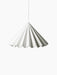A white Dancing Pendant Lamp hangs against a black background. The shade is pleated felt and has a wavy edge like a skirt.
