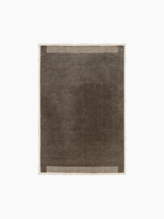 Top-down view of the rectangular Duomo Rug in Marble Grey, featuring an off-white border with a striped pattern on two sides.