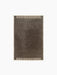 Top-down view of the rectangular Duomo Rug in Marble Grey, featuring an off-white border with a striped pattern on two sides.