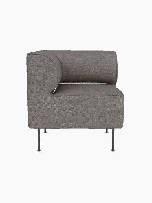 Front view of the Eave Dining Sofa Corner module upholstered in Audo Bouclé 16, a grey fabric, with slender metal legs.