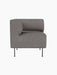 Front view of the Eave Dining Sofa Corner module upholstered in Audo Bouclé 16, a grey fabric, with slender metal legs.