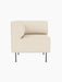 Eave Dining Sofa, Corner module upholstered in light cream Logan Jasmine, with a curved backrest and slender black legs.