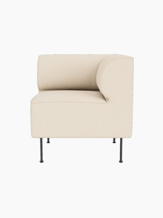 The Eave Dining Sofa, Corner module, upholstered in textured, cream-coloured Logan Jasmine fabric, on slim black metal legs.