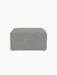 A front view of the Eave Modular Pouf, 75. The square pouf has textured, light blue and grey Safire 012 upholstery.