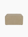 Front view of the Eave Modular Pouf, 75. The square pouf is upholstered in a textured, light beige Audo Bouclé 02 fabric.