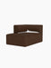 A three-quarter view of the Eave Modular Sofa Chaise Longue in brown Audo Bouclé 07 fabric against a plain black background.