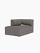 A three-quarter view of the Eave Modular Sofa Chaise Longue module in Audo Bouclé 16 fabric against a solid black background.