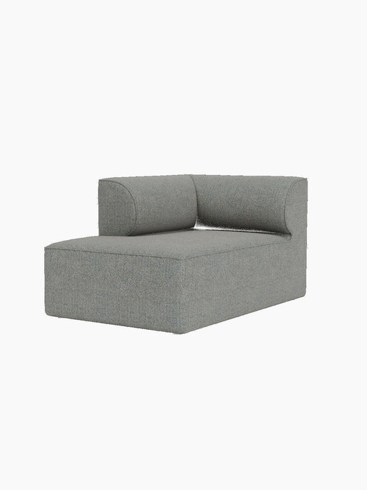 A three-quarter view of the Eave Modular Sofa, 86, Chaise Longue module upholstered in a light grey textured fabric.