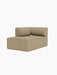 A three-quarter view of the Eave Modular Sofa Chaise Longue module, upholstered in a light brown textured fabric.