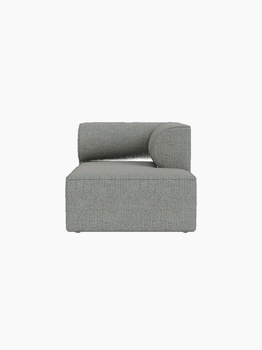 Front view of the Eave Modular Sofa, 86, Chaise Longue module in a light grey textured fabric against a black background.