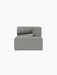 Front view of the Eave Modular Sofa, 86, Chaise Longue module in a light grey textured fabric against a black background.