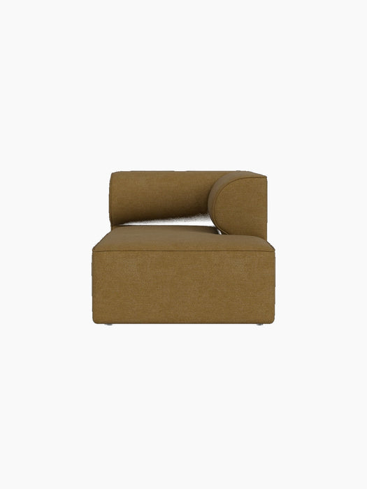 Eave Modular Sofa Chaise Longue module in mustard Audo Bouclé 06 fabric, shown from the front against a black background.