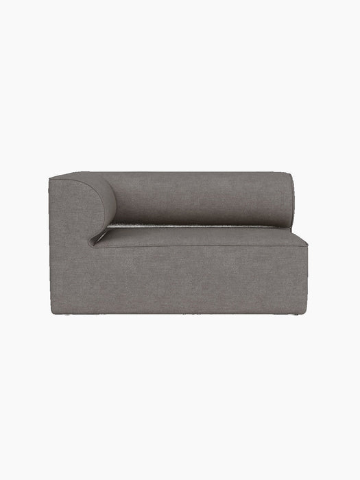 Side profile of the Eave Modular Sofa, 86, Corner 129. The module features a curved backrest upholstered in Audo Bouclé 16.