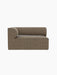 Side view of the Eave Modular Sofa, 86, Corner 129, in textured brown upholstery against a plain black background.