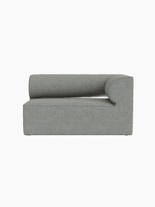 Front view of the Eave Modular Sofa, 86, Corner 129, in a light grey-blue textured fabric, isolated on a black background.