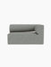 Front view of the Eave Modular Sofa, 86, Corner 129, in a light grey-blue textured fabric, isolated on a black background.