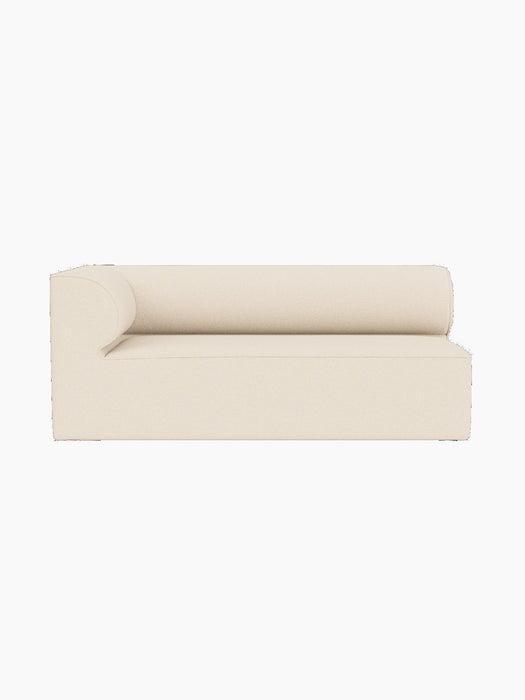 Eave Modular Sofa corner piece in Logan Jasmine fabric. A front view of the light cream module with a curved left armrest.