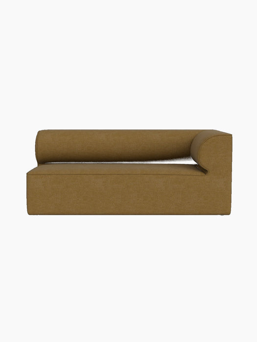 The Eave Modular Sofa, 86, Corner 172 module shown front-on. Upholstered in a mustard-coloured Audo Bouclé 06 fabric.