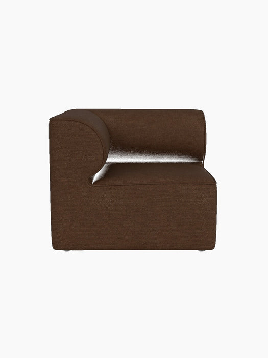 A front view of the Eave Modular Sofa, 86, Corner unit in a brown Audo Bouclé 07 fabric, isolated on a black background.