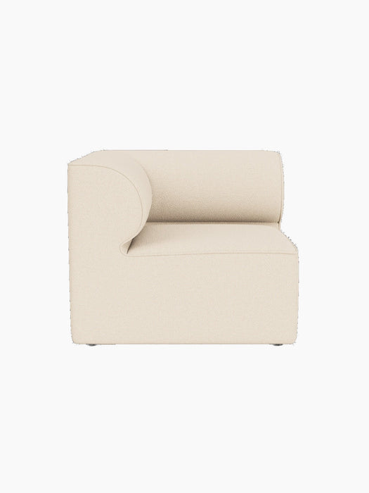 Top-down view of the Eave Modular Sofa, 86, Corner in light beige Logan Jasmine fabric, isolated on a black background.