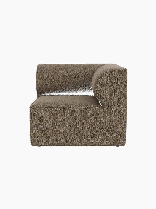 Front view of the Eave Modular Sofa 86 Corner upholstered in a brown and black textured fabric against a black background.