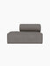 Front view of the Eave Modular Sofa, 86, Open End module in light grey Audo Bouclé 16 fabric against a black background.