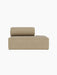 Front view of the Eave Modular Sofa, 86, Open End module in light brown Audo Bouclé 02 fabric against a black background.