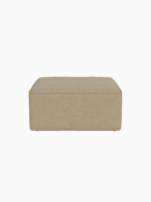 Front view of the Eave Modular Sofa 86 Pouf in a light beige Audo Bouclé 02 fabric, shown against a plain black background.