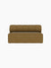 Front view of the Eave Seamline Modular Sofa, Open Section 172, in a mustard Audo Bouclé 06 fabric on a black background.