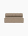 A front view of the Eave Seamline Modular Sofa, Open Section 172, upholstered in a textured, light-brown Logan Flint fabric.