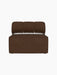 A top-down view of the Eave Seamline Modular Sofa, 86, Open Section, in a dark brown bouclé fabric on a black background.