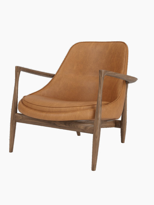 A three-quarters view of the Elizabeth Lounge Chair, featuring a dark walnut frame and cognac-coloured leather upholstery.