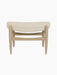 Elizabeth Ottoman with a natural oak frame and a curved seat upholstered in light beige Hallingdal fabric.
