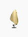 The Flambeau Candle Holder with a black metal base and a large, organically shaped polished brass reflector.
