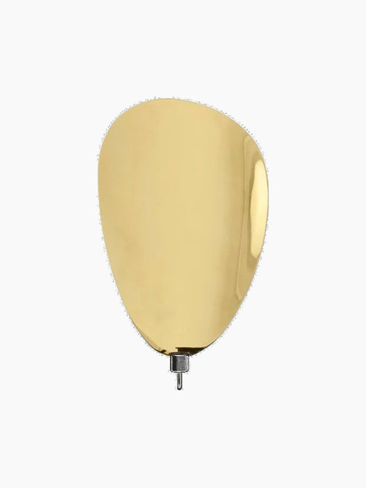 Front view of the Flambeau Candle Holder H40 Wall. It has an organic shaped, polished brass backplate with a black holder.