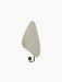 A Flambeau Wall Candle Holder with a grey, teardrop-shaped backplate and a bronzed brass arm holding the candle cup.