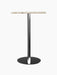 Harbour Column Bar Table with a rectangular off-white marble top, a slender black column, and a round black base.