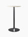 Harbour Column Bar Table with a round off-white marble top, slender black column, and flat circular base.