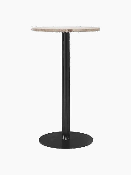 Front view of the Harbour Column Bar Table with a round Kunis Breccia stone top, a slim black column and a round base.