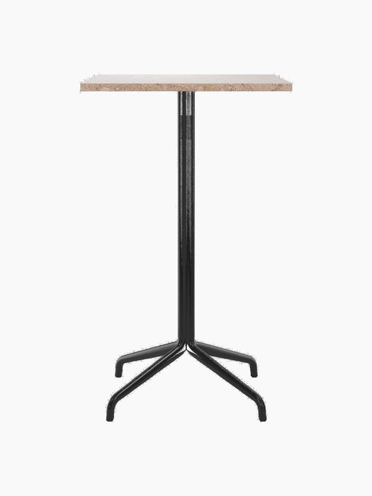 Front view of the Harbour Column Bar Table, featuring a rectangular Kunis Brescia stone top and a sleek black star base.