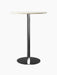 A Harbour Column Bar Table with a round off-white marble top, a slender black central column, and a flat circular black base.