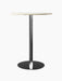 A front view of the Harbour Column Counter Table with a round, off-white marble top on a slim black central column and base.