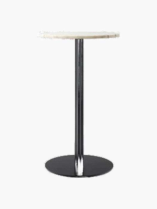 The Harbour Column Counter Table with a round, off-white marble top and a slender black column with a circular base.