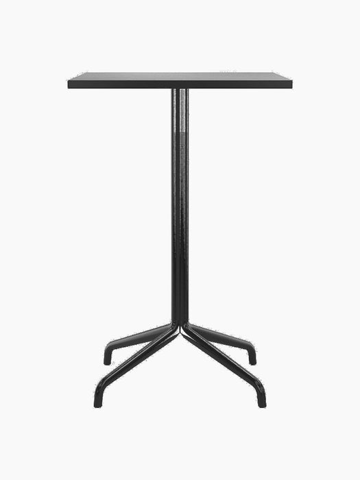 Front view of the Harbour Column Counter Table with a rectangular black oak top and a black star base on a black background.