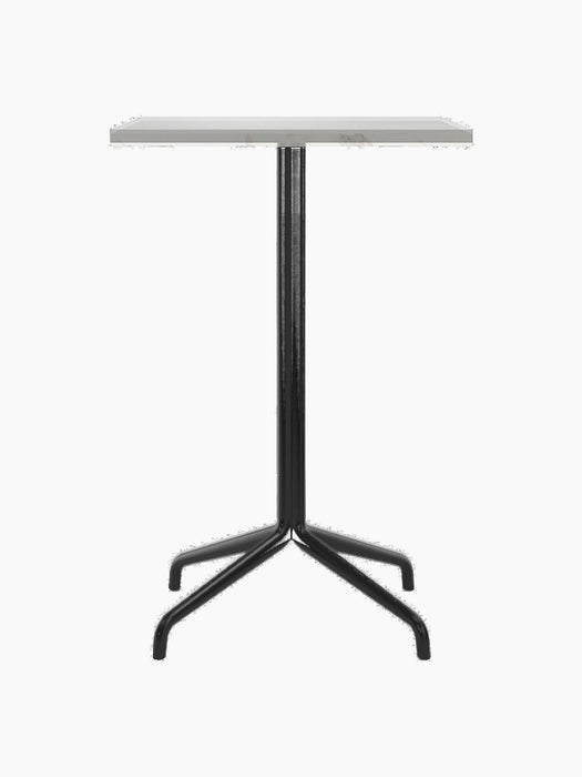 Front view of the Harbour Column Counter Table with a rectangular Estremoz marble top and a black star base.