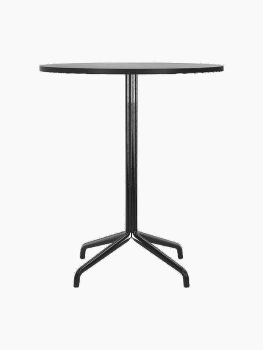 Front view of the Harbour Column Counter Table, featuring a round black oak top and a slender black column with a star base.