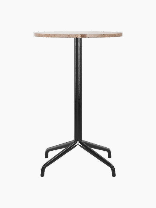 Front view of the Harbour Column Counter Table with a round Kunis Breccia stone top and a slim black star base.